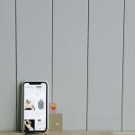 ecommerce smartphone displaying site credit card set wooden surface depicting online