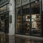 gucci stylish storefront detroit reflecting kentsel elegance rainy gun