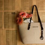 michael kors stylish michael kors handbag pink gerbera flowers rustic vintage pages