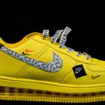 nike bright yellow athletic sneaker text patterns swoosh isolated black arka plan