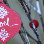 noel close up red ornament rustic branch perfect holiday decor themes